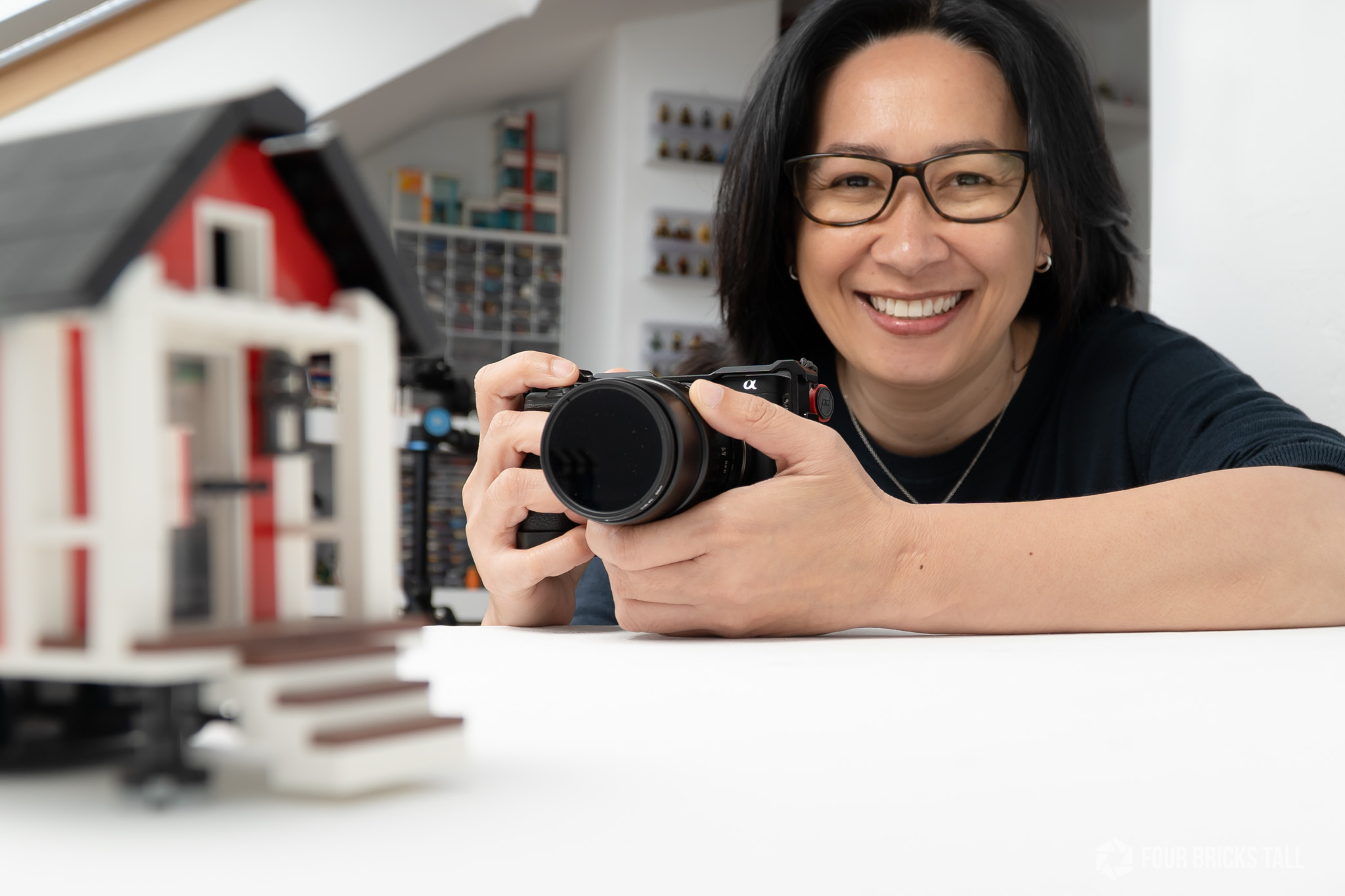 Photo of LEGO photographer Anna Bitanga known as Four Bricks Tall holding a Sony camera