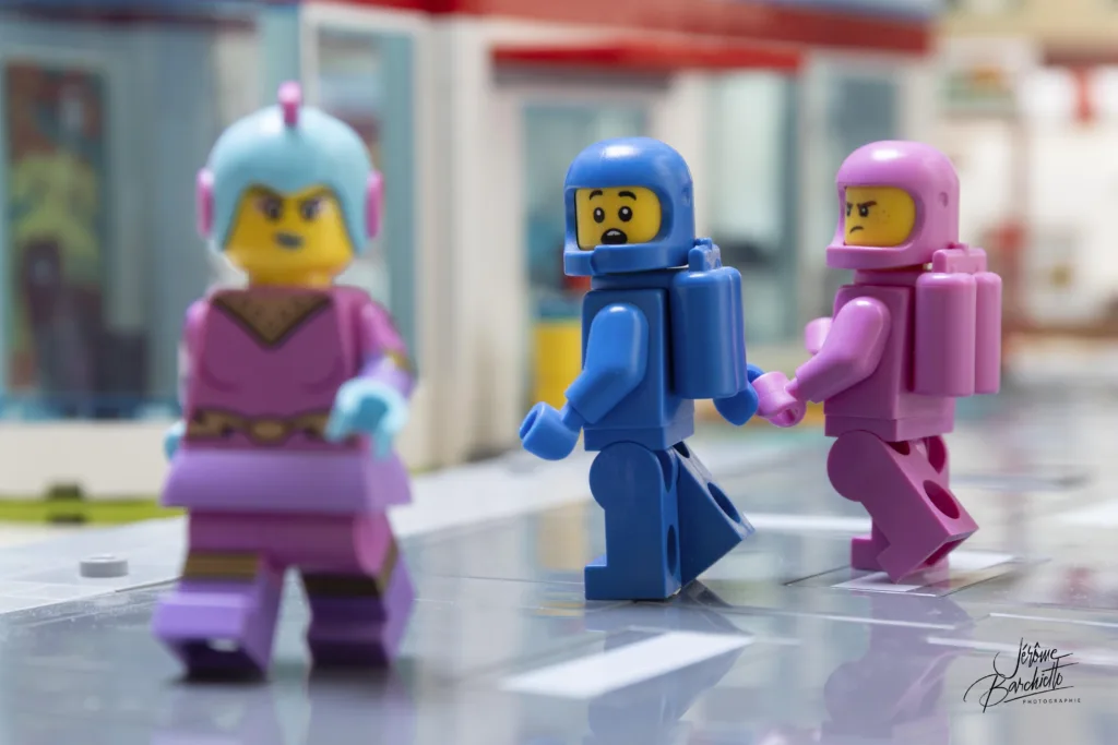 Photo of LEGO space minifigures in the style of the Distracted Boyfriend meme
