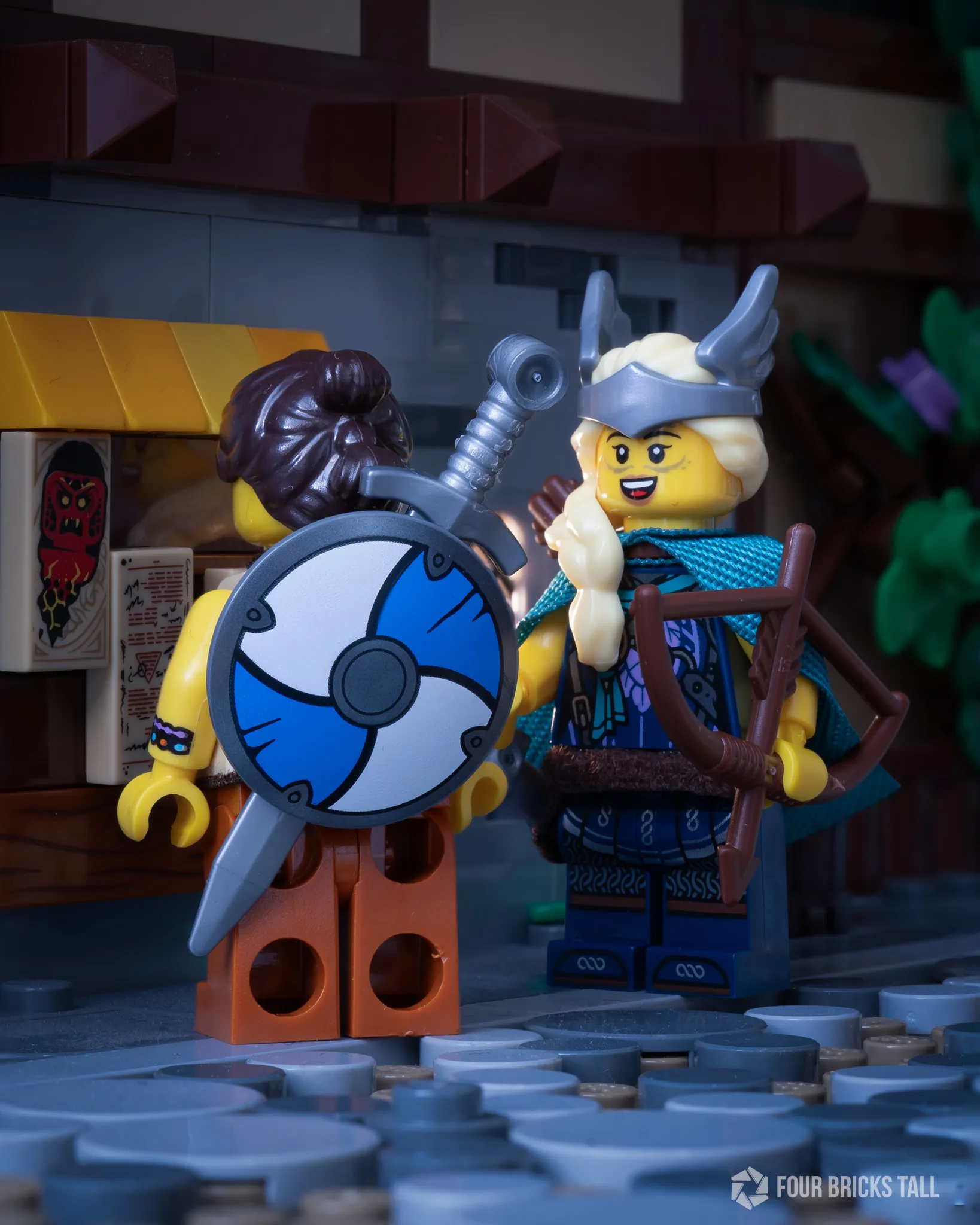 LEGO Viking shieldmaidens with a shield and sword strapped on the back