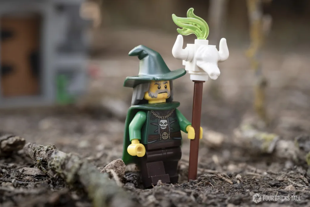 Medieval LEGO minifigure wizard with skull staff. The torso is from BAM.